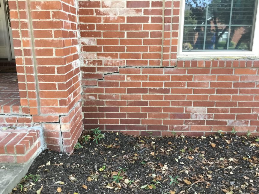 arkansas home foundation repair cracks in a red brick home